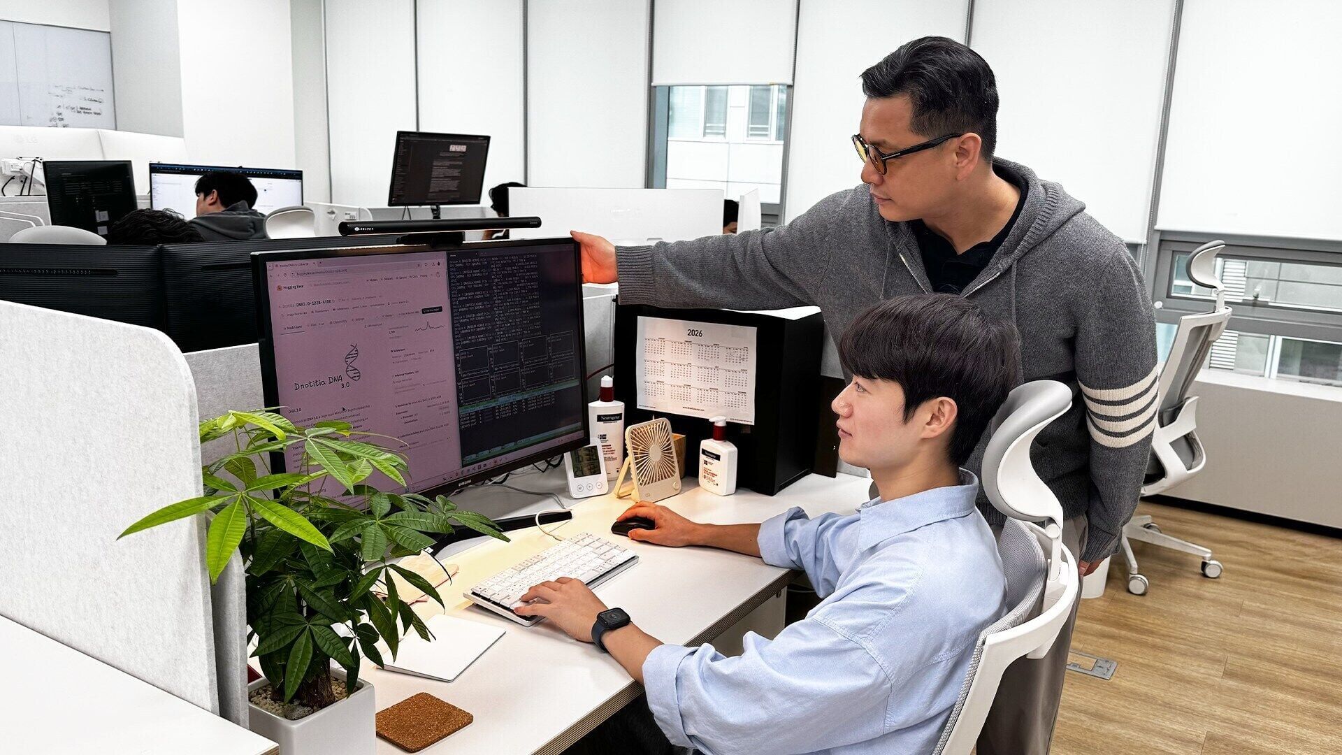 Dnotitia’s engineers reviewing the performance of DNA 3.0