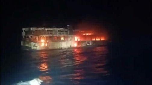 The coast guard has yet to establish the cause of the fire, but said one survivor reported hearing a 'loud explosion' from the cargo hold