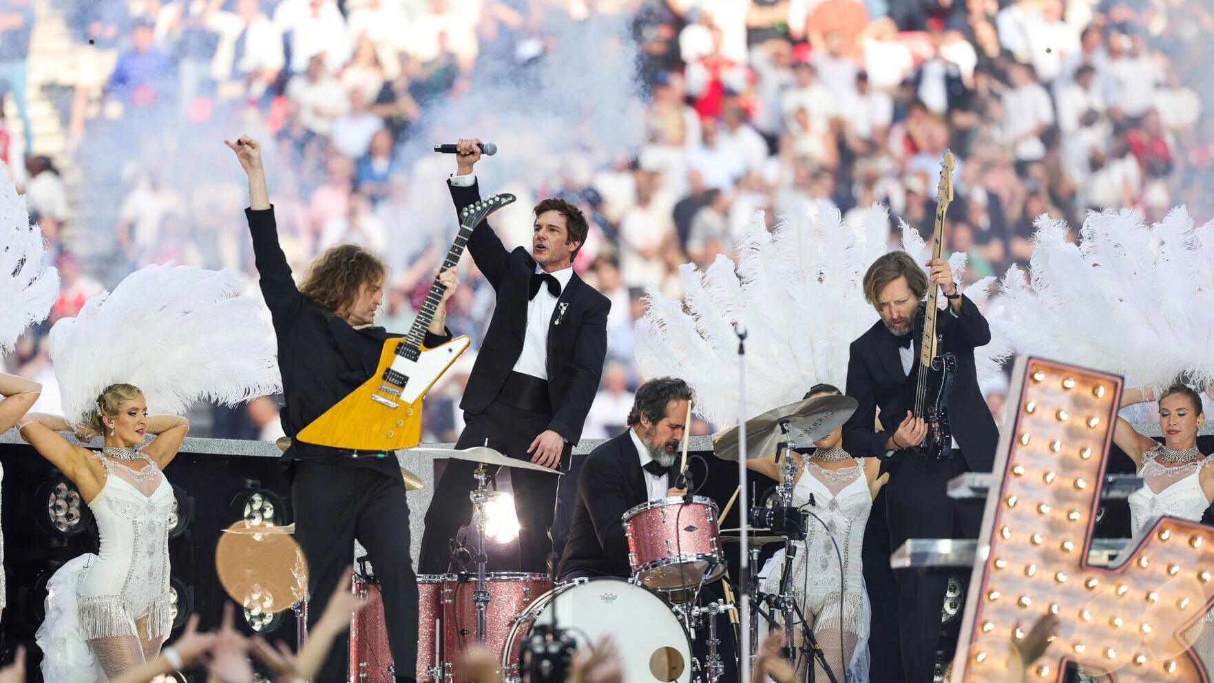 THE KILLERS headline the UEFA Champions League Final Kick Off Show presented by Pepsi at the Puskás Aréna in Budapest, via Getty Images.
