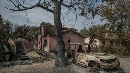 At least 200 homes were destroyed and two firemen killed in the fires