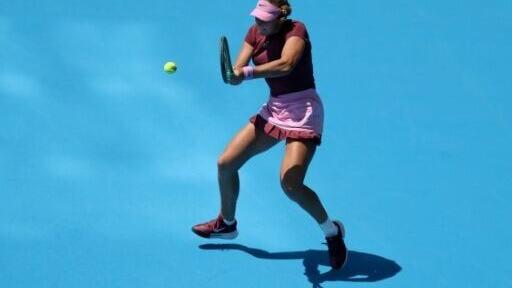 Mirra Andreeva returns a shot during a victory over Janice Tjen of Indonesia at the WTA and ATP Cincinnati Masters