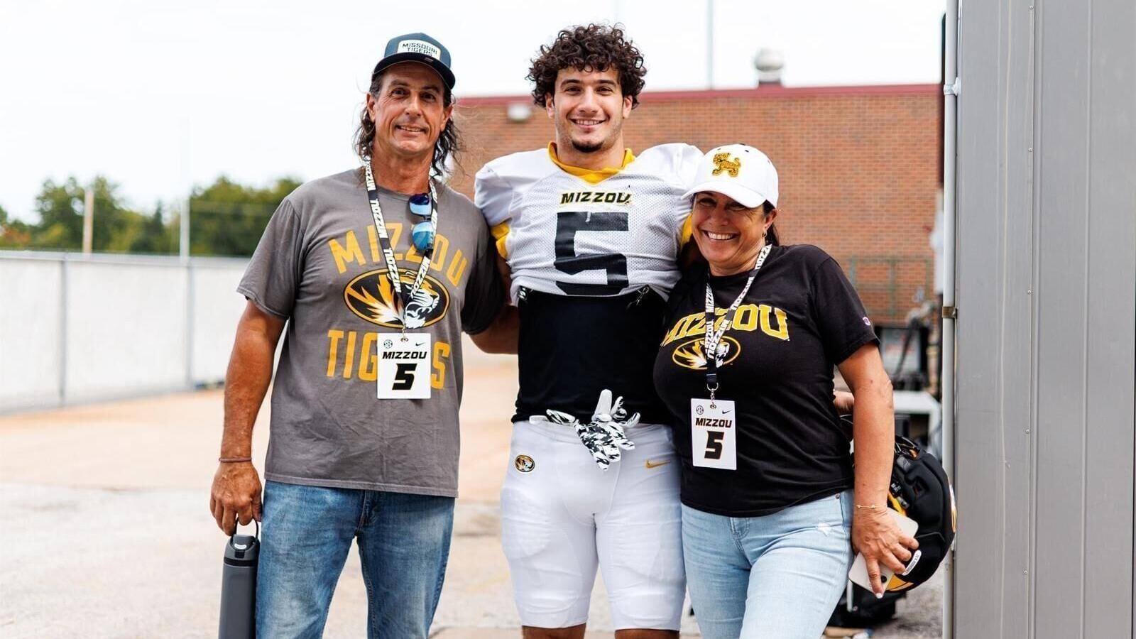Nick Rodriguez and his parents