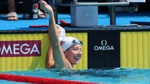 American Kate Douglass celebrates her 50m freestyle world record at the Pan Pacific Championships in Irvine, California