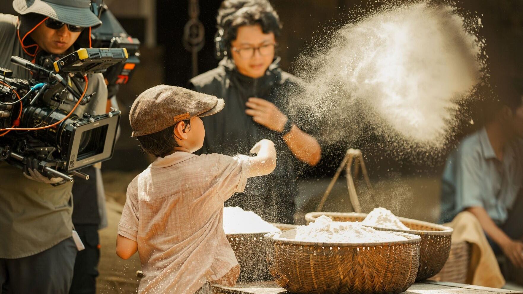 Nguyen Vu Uy Nhan films a scene as young Daniel during production of "Chrysalis" in Vietnam.