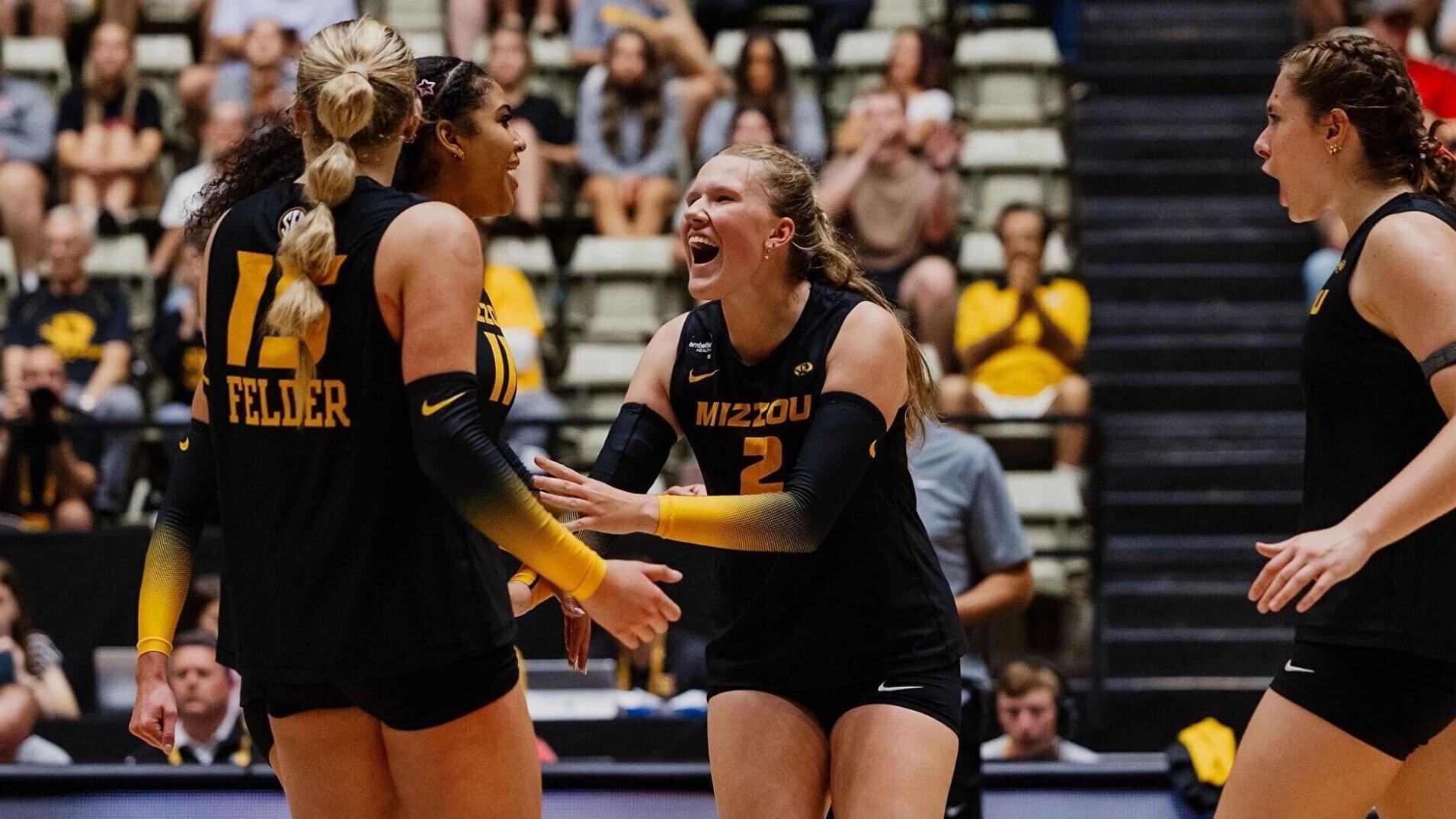 Sierra Dudley (2) celebrates with other members