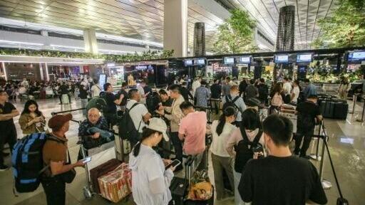 Indonesia halted operations at its main international airport outside Jakarta after ash spewed from the Anak Krakatoa