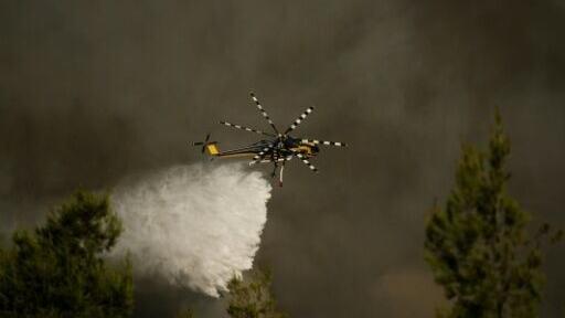 Officials had warned for days that violent winds made fire-fighting operations from the air hazardous