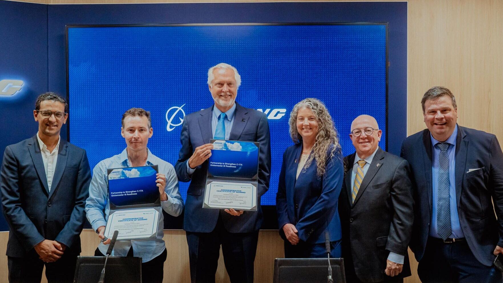 Pictured (L-R): Hamza Charrouf, Chief Customer Officer, Pelico; Tarik Benabdallah, CEO, Pelico; Turbo Sjogren, Vice President and General Manager, Government Services, Boeing Global Services; Kate Muhich, Vice President, Government Supply Chain, Boeing ...