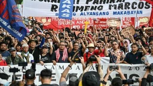 Protesters demonstrate in Manila as Philippines President Ferdinand Marcos delivers his State of the Nation Address in the House of Representatives