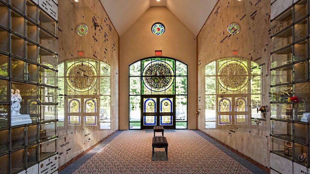 A peaceful expression of faith, beauty, and remembrance at **Maryrest Cemetery &amp; Mausoleum in Mahwah, New Jersey**. Elegant marble crypts and glass-front cremation niches surround visitors with dignity and serenity, while magnificent stained-glass windo...