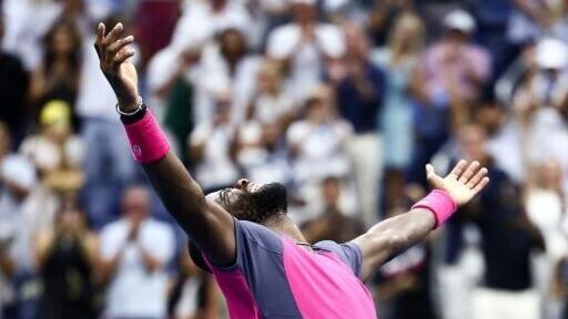 Frances Tiafoe celebrates his five-set victory over fellow American Alex Michelsen in the US Open quarter-finals