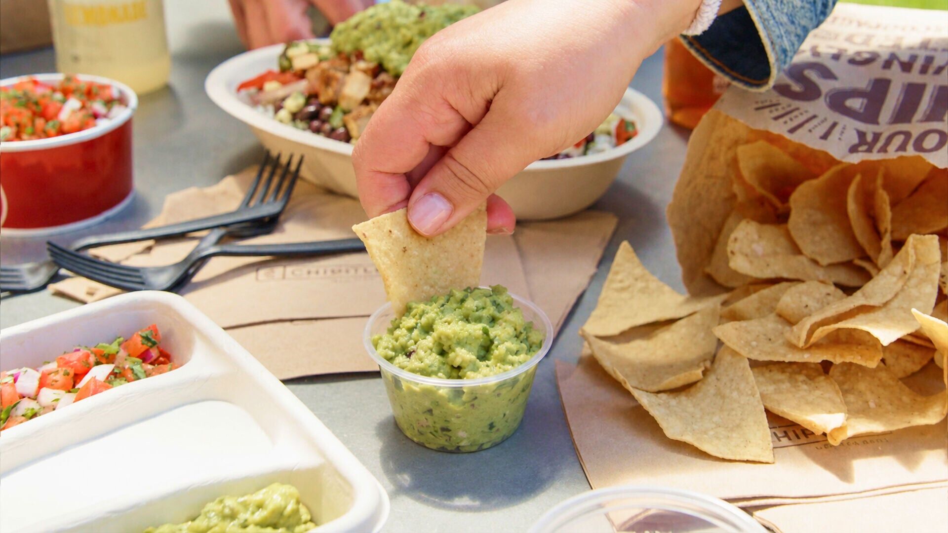 Chipotle is celebrating National Avocado Day with a free chips and guac offer with an entrée purchase on July 31 and August 1 with code AVO2026 on the Chipotle app and Chipotle.com.