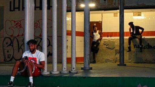 Havana residents outside of their houses during a blackout in August 2026