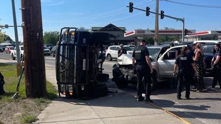 Multi-agency response after rollover crash hits power pole in Missoula