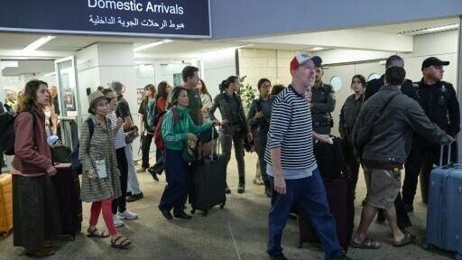 Passengers landed at Israel's Ben Gurion Airport after the their earlier flight was diverted to Saudi Arabia following what Prime Minister Benjamin Netanyahu described as an attempt by one of the pilots to crash the plane
