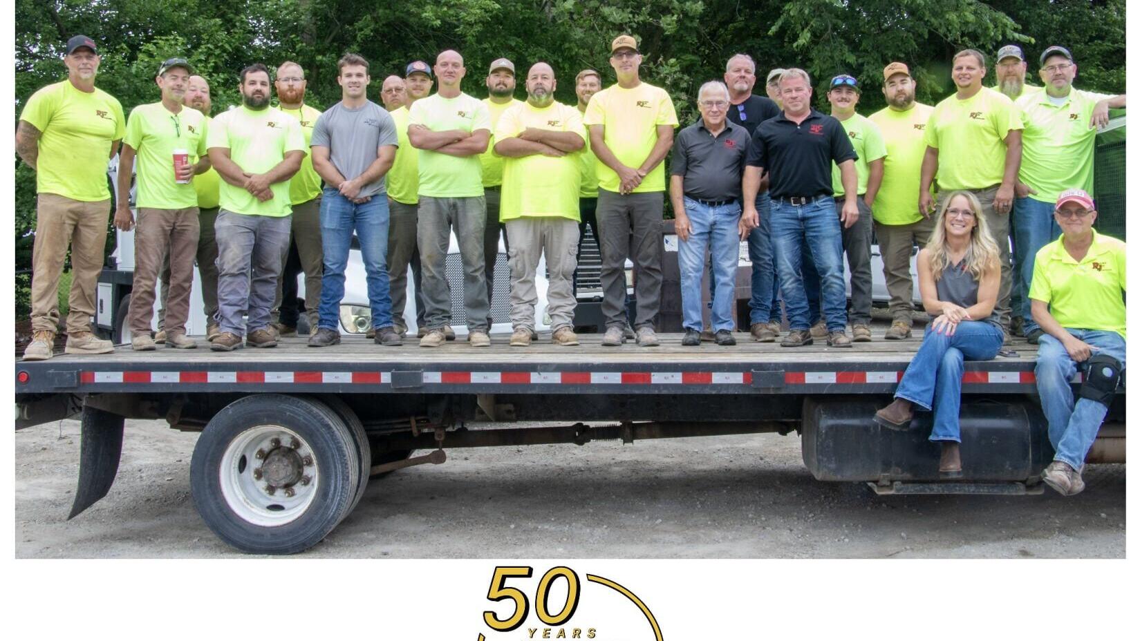 Double Jay Construction's employees and the Blair family mark the company's 50th anniversary with a commemorative team photo. Founded in 1976 and led by three generations of family leadership, the Englewood-based contractor has built its reputation on h...
