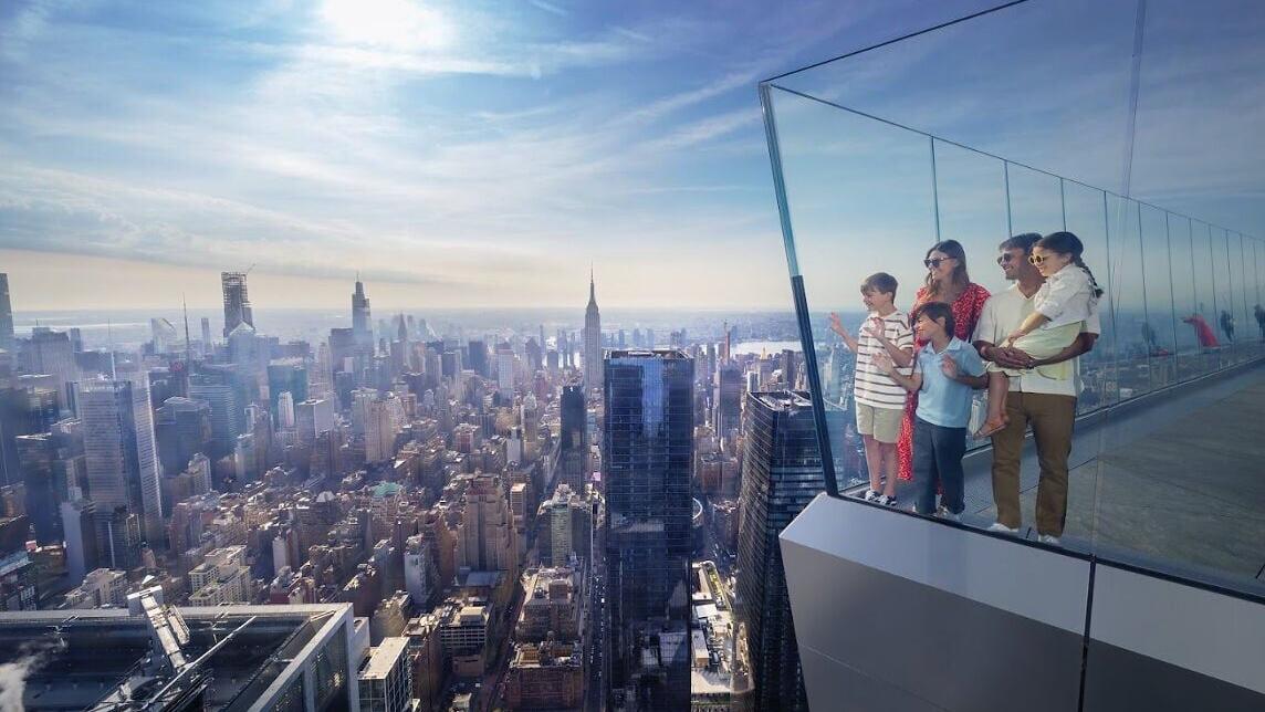 Family on Eastern Overhang of Edge Skydeck