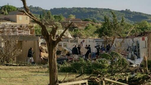 Some houses had their roofs torn off