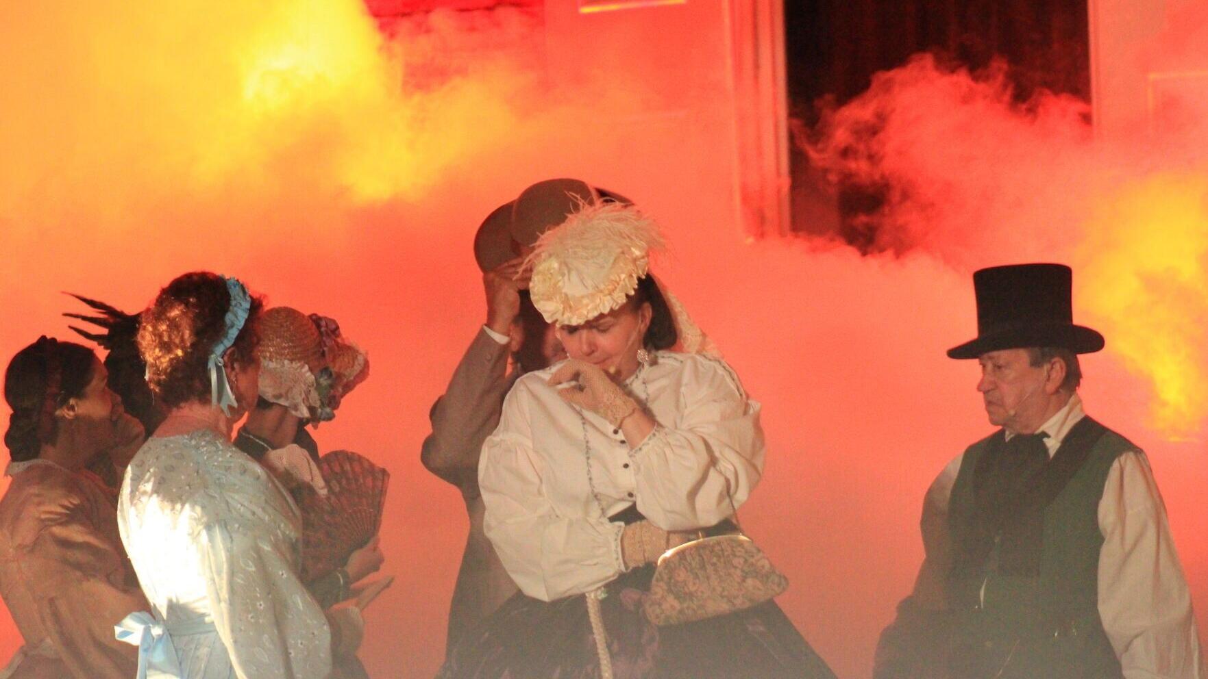 The flames and smoke enveloped the townspeople, who stood helpless as the core of Chambersburg burned.
