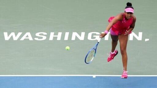 Japan's Naomi Osaka is through to the quarter-finals of the ATP and WTA tennis tournament in Washington