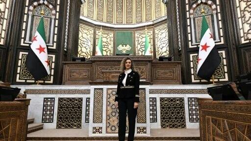 Syria's parliament deputy speaker Madonna Beshara poses inside the parliament in Damascus on July 27, 2026