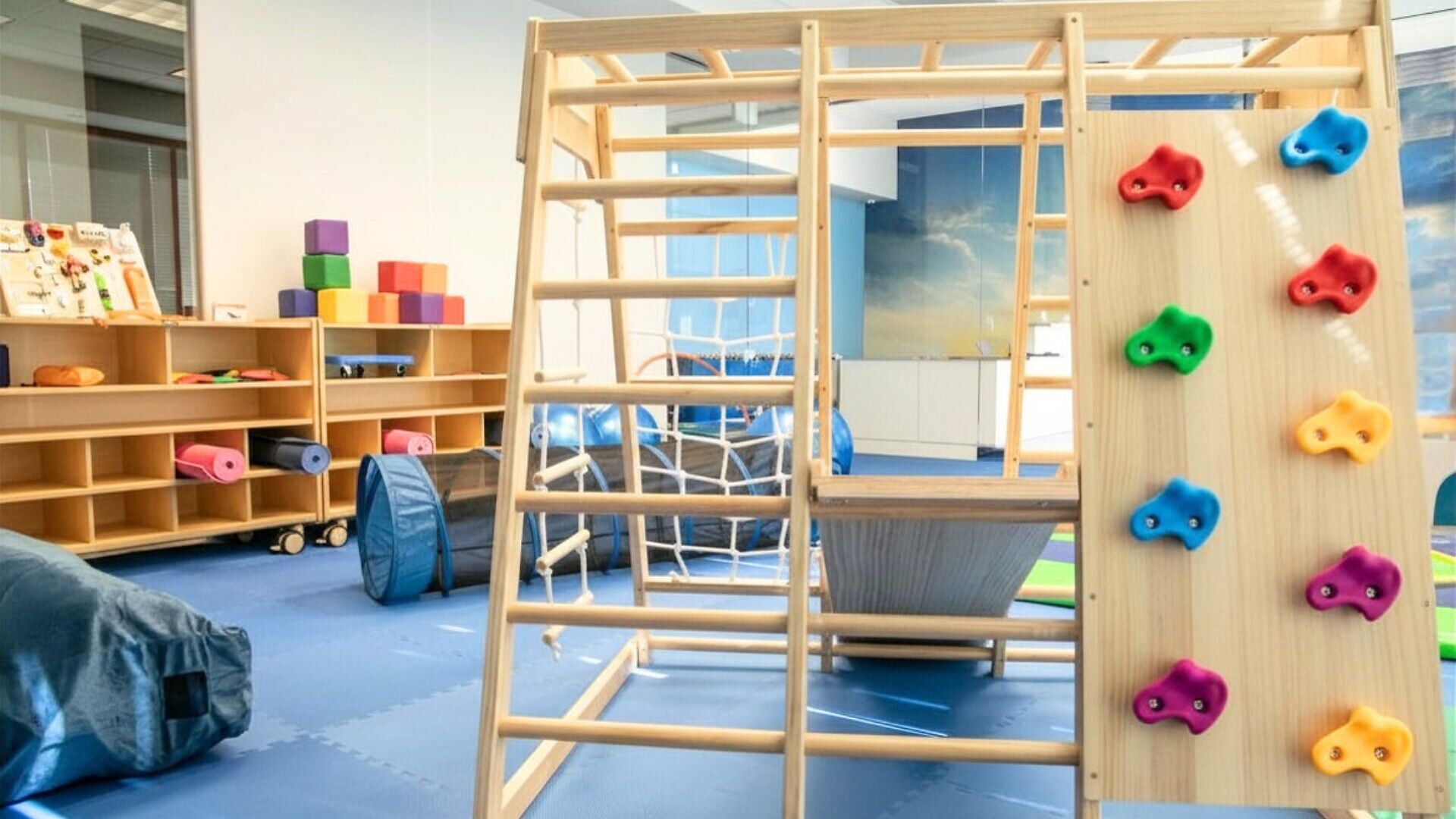 Climbing Wall in Behavior Frontiers' ABA Therapy Center Gross Motor Room for Developing Movement Skills in Kids with Autism