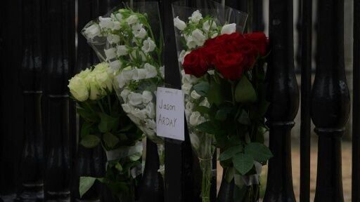 Small floral tributes are laid for Jason Arday at Cambridge University