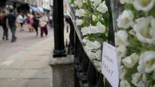 Small floral tributes to the late academic Jason Arday have been posted outside the University of Cambridge