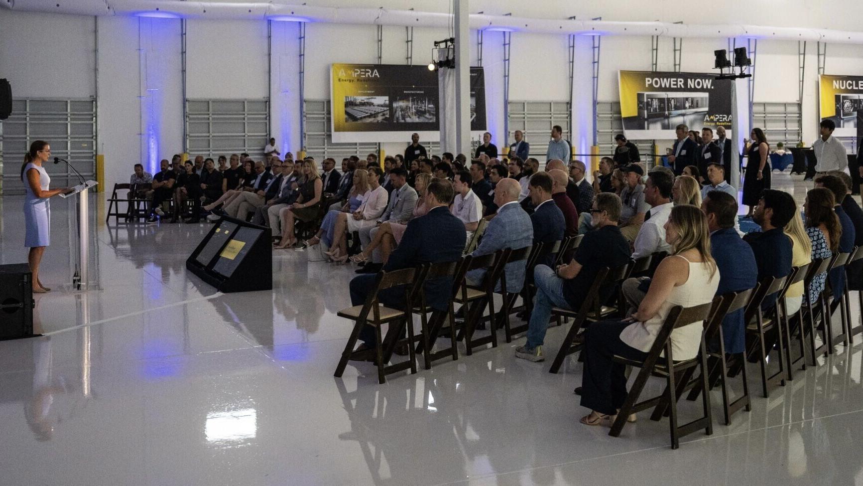 Palm Beach Gardens Mayor Dana Middleton addresses the crowd at the AMPERA unveiling event on July 1, 2026, celebrating the company’s leadership in manufacturing and innovative technology and the opportunity it brings to the city. (PRNewsfoto/AMPERA)