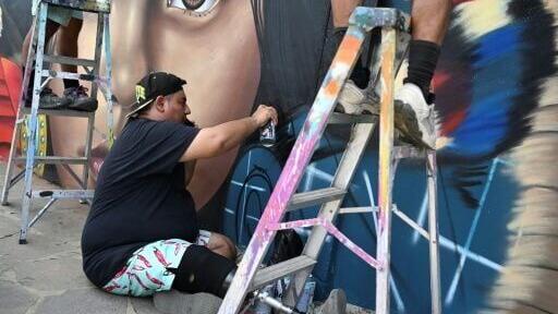 Urban artists create murals in the traveling Pigmen Trip festival, held for eight years in different locations in El Salvador