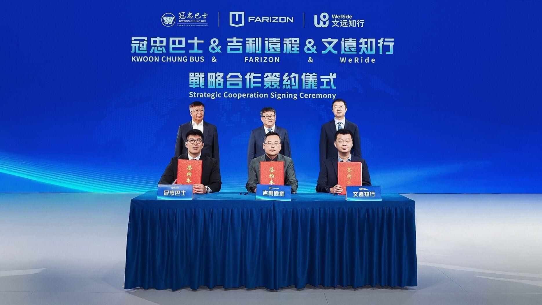 Song Zhaohuan, Vice President of Geely Farizon New Energy Commercial Vehicle Group; Li Yifan, Vice President of WeRide; and Timothy Wong, Executive Director of Kwoon Chung Bus Holdings, sign a cooperation agreement, witnessed by Mike Fan, CEO of Geely F...