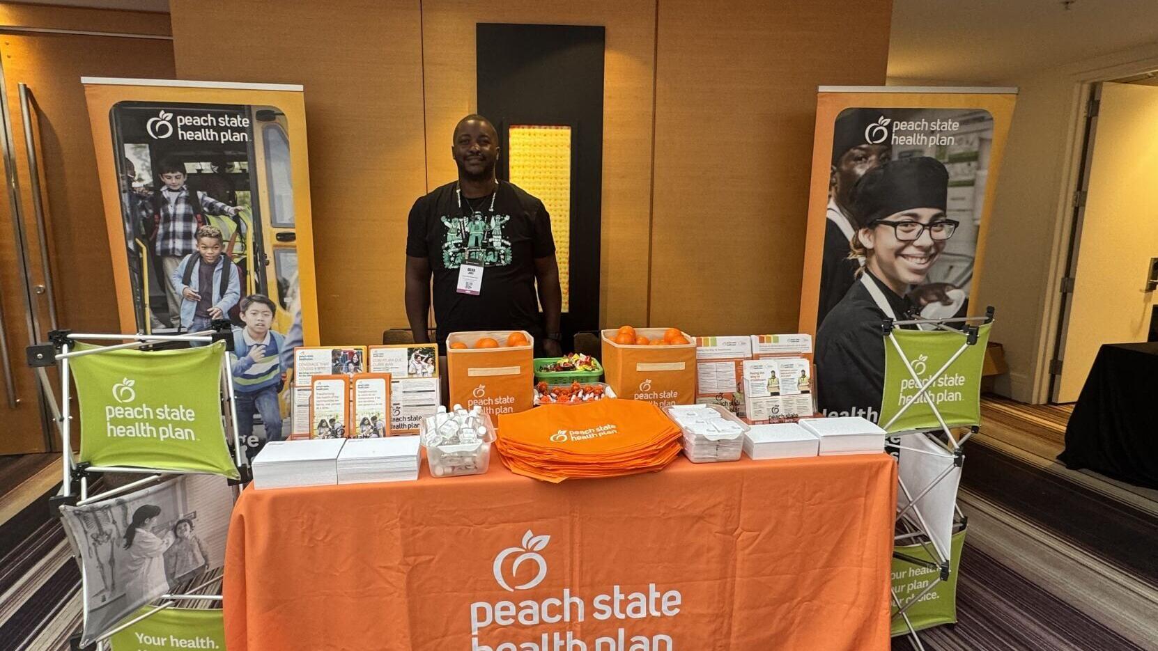 Brian Jones, Community Relations Representative for Peach State Health Plan, shares information and resources with attendees at the 2026 Big Brothers Big Sisters National Conference in Atlanta, Georgia.