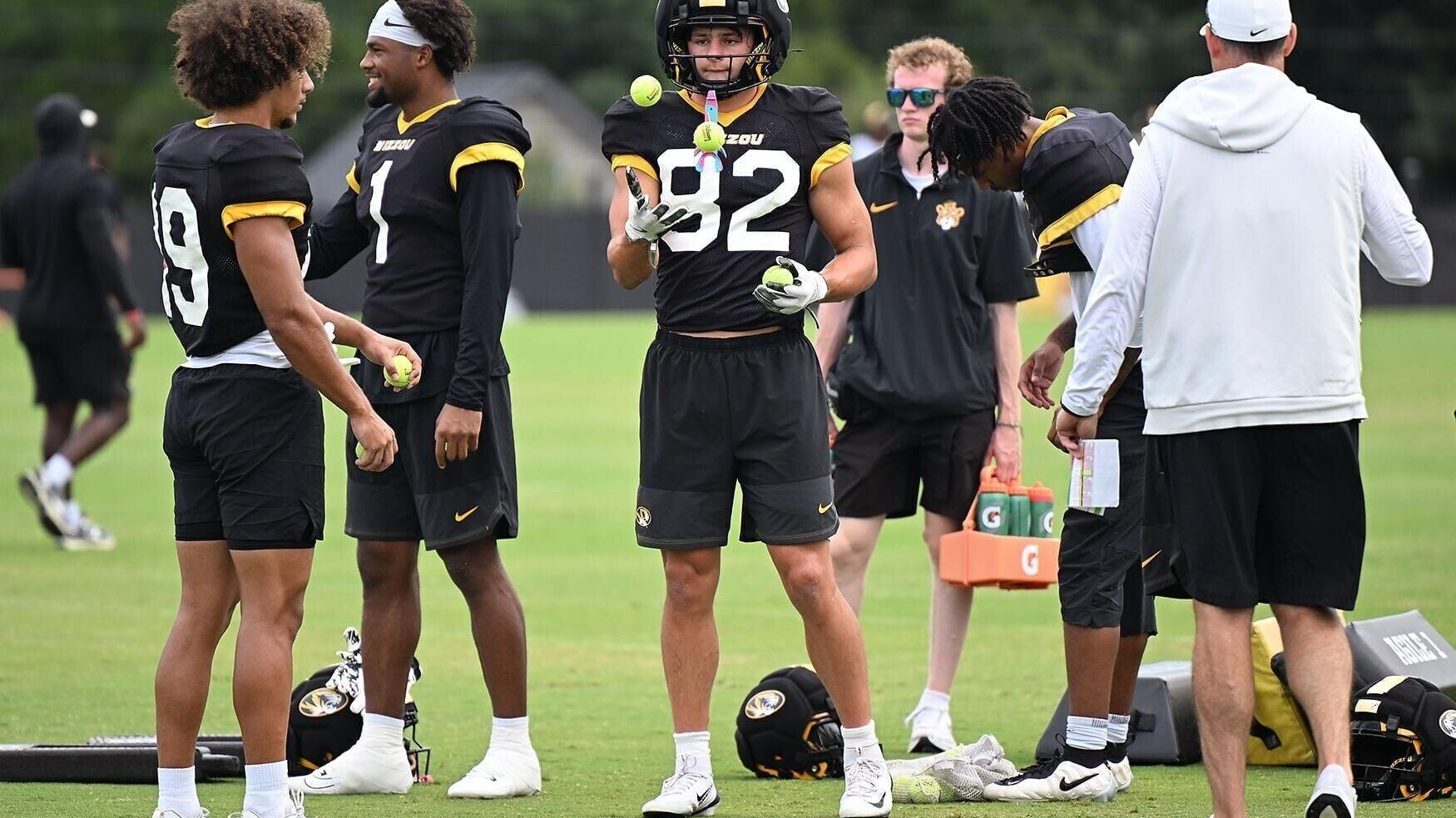 Mizzou wide out Noah Flaskamp (82) juggles tennis balls