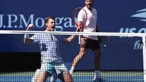 Britain's Neal Skupski and American Christian Harrison celebrate after defeating Germany's Kevin Krawietz and Tim Puetz in the US Open men's doubles final
