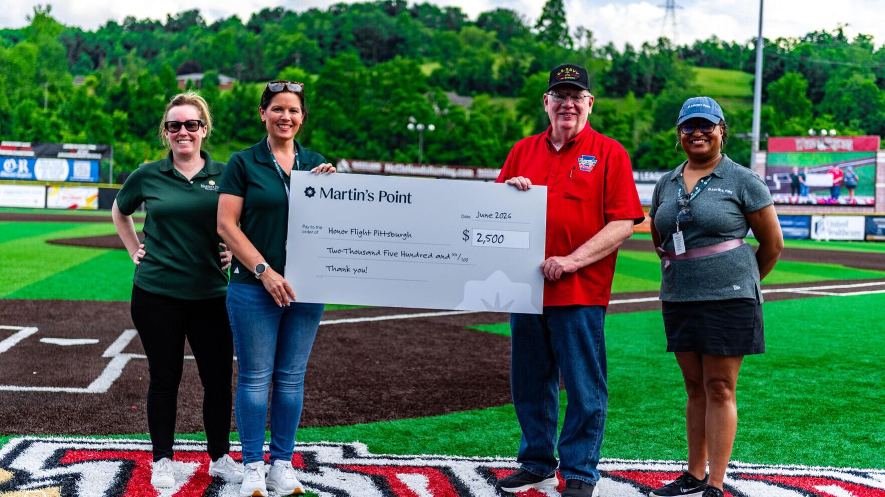 Martin's Point Presents Charitable Contribution to Honor Flight Pittsburg.