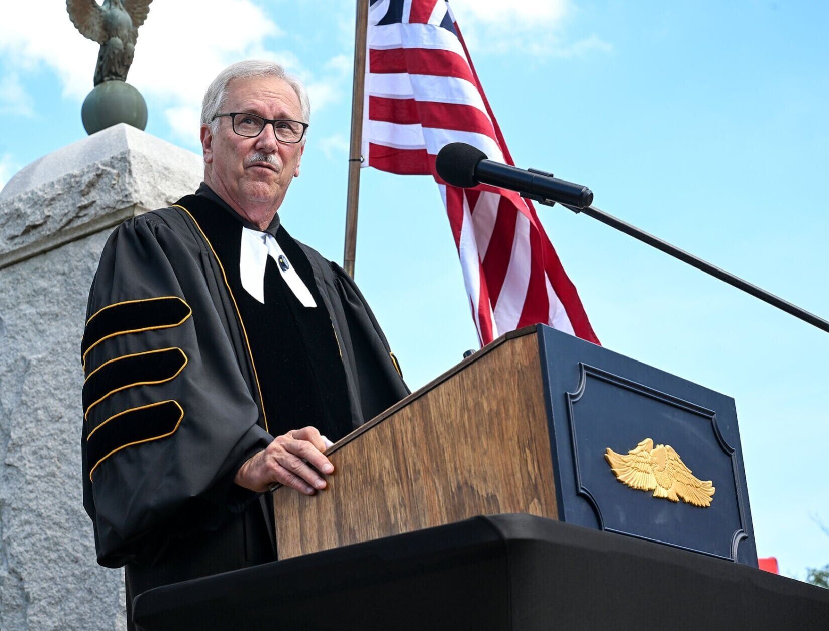 Pastor Greg Morrow reads the Declaration of Independence