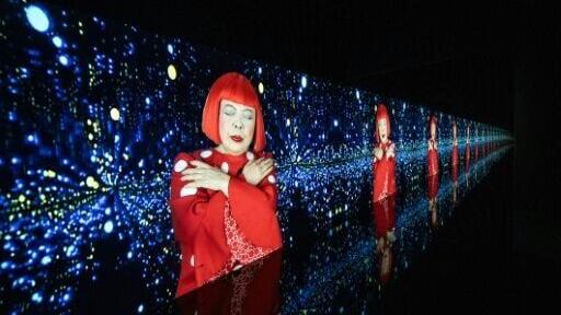 (FILES) A video projection of "Song of a Manhattan Suicide Addict" by Japanese artist Yayoi Kusama is seen during the media preview of the exhibition "I would overcome death and go on living" at Yayoi Kusama Museum in Tokyo on October 16, 2024. Japanese...