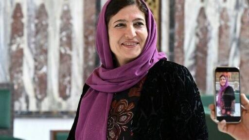 Syria's member of parliament Fasla Yousef poses inside one of the halls of parliament in Damascus on July 27, 2026