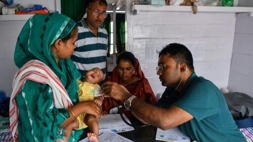 The network of mobile 'hope' boat clinics brings doctors, medicines and vaccines to 13 districts in India's Assam state