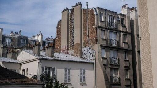 Paris residents closed shutters to block out the sun and heat during a heatwave in July